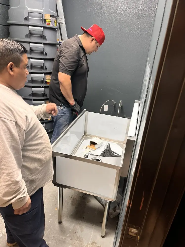 Commercial plumbing and sink installation in Versailles